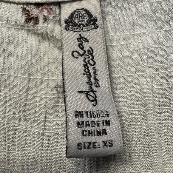 American Rag white floral A line mini skirt, elastic waist, long sleeves, XS. - Picture 11 of 14